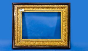 Victorian Giltwood Picture Frame, with gesso edging, with a simulated rosewood outer frame, 20