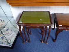 20th Century Nest of Three Tables, raised on cabriole legs, with green tops.