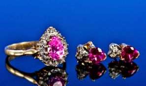 9ct Gold Dress Ring Set With A Central Pear Shaped Pink Stone Surrounded By White Stones, Fully