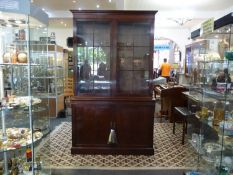 Large Two-Tier Mahogany Bookcase, in the Georgian style, the upper part fitted with open shelves,