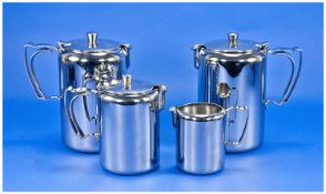 Four `Old Hall` Stainless Steel Jugs, comprising pair of 2pt lidded jugs, 1pt lidded jug and a 1/2