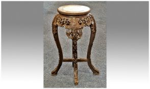 Oriental Plant Stand, probably made from padouk wood, with marble centre to top, moulded edge,