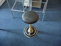 Sterling Operating Stool, with a Vinyl seat, rotating and lifting up, raised on a chrome base.