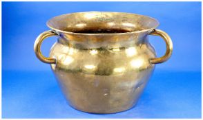 Large Brass Three Handled Jardiniere, planished, approximately 8 inches high.