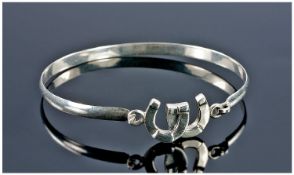 Silver Bangle With Double Horse Shoe Fastener. Stamped 925.