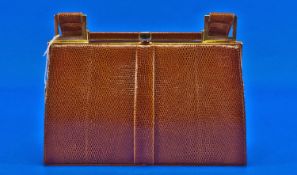 Tan Lizard Skin Jane Shilton Handbag, goldtone frame with snap clasp, the leather lined lizard
