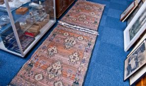 Two Egyptian Wool Rectangular Rugs, 80 by 40 cms. Label to reverse reads `Gabbeh`, Asiatic Carpets,