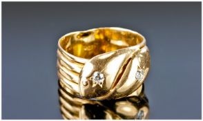 18ct Gold Vintage Snake Ring. Set with diamond eyes. stamped 18ct. 6.1 grams.