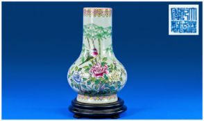 Chinese Porcelain Famille Verte Qing Dynasty Vase, with blue Quianlong mark to the base, probably
