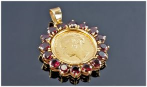 Victorian Fine Young Head Full Gold Sovereign. Date 1879. Set within a 9ct gold and garnet pendant.