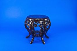 A Small Carved Chinese Hard Wood Stand, 9.5 inches in height.