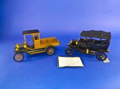 Two Franklin Mint Ford Model T Scale Models, comprising a pickup and a car.