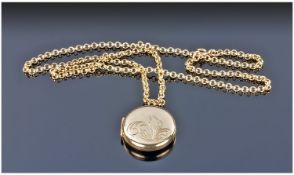 9ct Gold Circular Locket, supported on a 9ct gold belcher chain. Fully hallmarked. 10.7 grams.
