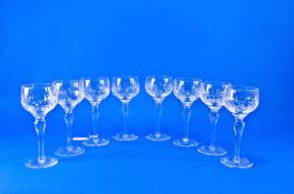 Set of Eight Stuart Cut Glass Wine Glasses, raised on slender stems, star cut bases, marked to