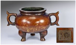 An Extremely Fine Thickly Cast Bronze Chinese Censer with a compressed globular form body,