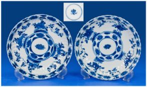 Pair of Chinese Kangxi Blue and White Fluted Saucer Dishes, hand decorated with attractive floral