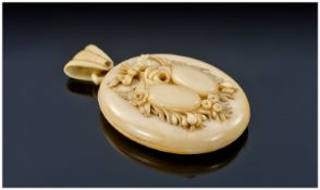 Large Victorian Carved Ivory Locket, Of Oval Form The Front With Applied Spray Of Flowers With Two