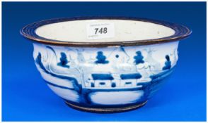 Small Oriental Jardiniere, underglaze blue and white decoration with matt brown everted rim and