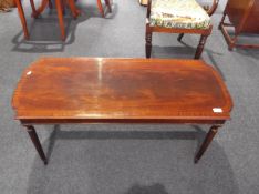 Modern Mahogany Coffee Table, the top with flame mahogany veneering and cross-banding to edge,