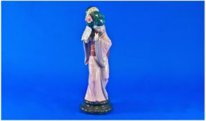 Lladro Figure `Chrysanthemum`, model no 4990. Issued 1978, last year 1998. Height 11.5 inches.