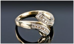 9ct Gold Diamond Dress Ring, Set With 14 Channel Set Round Cut Diamonds On A Twist. Fully