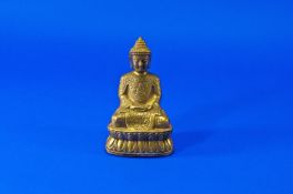 A Small Chinese Bronze Buddha with a seal character mark to base. 5.5 inches high.