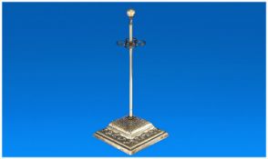 An Early 20th Century Metal Hat Pin Holder. Square base with cornucopia and dot decoration. The