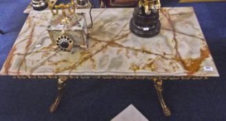 Large Onyx Topped Coffee Table, of rectangular form, raised on an elaborate gilt frame, 18 inches