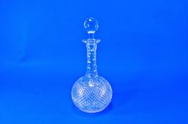 Mid Victorian Cut Glass Decanter, of shaft and globe form, the stopper and decanter shaft with