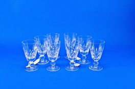 Set of Eight Cut Glass Drinking Glasses, with conical bowls, knopped stems, star cut bases, 5