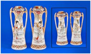 Pair of Royal Nishiki Nippon Vases with hand painted opposing scenes of a Japanese lady carrying a