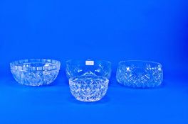 Four Various Cut Glass Bowls, comprising three fruit bowls and one small bowl, all elaborately cut