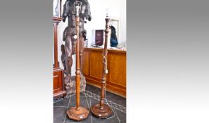 Two 20th Century Standard Lamps, 68 inches high.