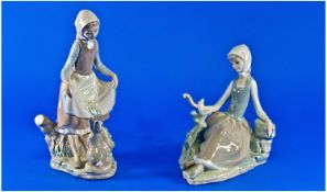 Lladro Figures 2 in total 1. Shepherdess with dove, model no 4660, height 6.5 inches. Issue no