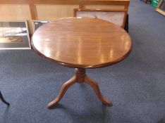 Mahogany Tilt Top Tripod Table, 19th century elements, the top raised on a beech turned column,