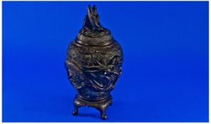 Bronze Dragon Koro with lid caset to the body with a dragon circuling the vase and the lid