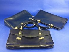 Two Navy Blue and One Black Leather Handbags all with double carry handles and gilt fittings (3)