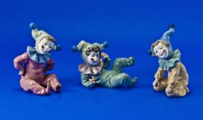 Three Nao Figures `Jingles, Jangles & Joy`, young children dressed as polychrome pierrots, issued