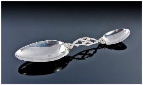A Scarce Articulated Silver Travelling Spoon. Pierced bridge with both teaspoon and dessert spoon