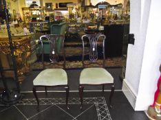Pair of Edwardian Mahogany Parlour Chairs, with pierced back splats, raised on slender cabriole