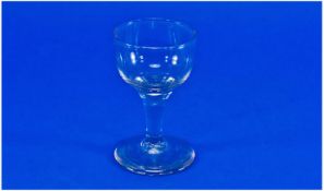 Nineteenth Century Dram Glass with plain bowl, stands 3.75 inches high.