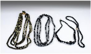 Small Collection of French Jet and Black Bead Necklaces, some with lustre effects including a 4