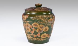 Doulton Lambeth Lidded Tobacco Jar with Raised and Applied Floral Decoration. Height 5.5 Inches.