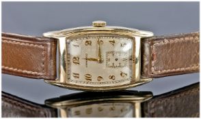 Gents Longines Wristwatch, Tonneau Shaped Silvered Dial, Gilt Arabic Numerals And Alpha Hour And