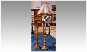 Large Modern Gilt Lamp, decorative column, tasselled shade, raised on a circular base with acanthus