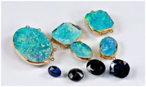 Collection Of Four Loose Sapphires. Approx 8.98 cts. Together With Five Black Opal Doublets Mounted