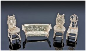 Dutch Miniature Silver Suite In The French Louis XV Style Together With A Miniature Chair + Two