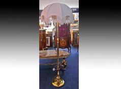 Modern Brass Standard Lamp, fitted with tasselled shade, 65 inches high.
