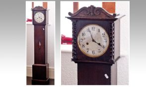 Early 20th Century Oak Grand Daughter Clock, with silvered dial, Arabic numerals, applied barley