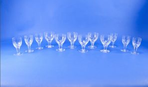 Set of Six Cut Glass Drinking Glasses, with simple cut bodies and faceted stems, together with a